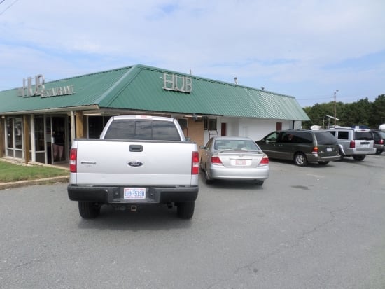 Vehicles start parking early for lunch at The Hub.